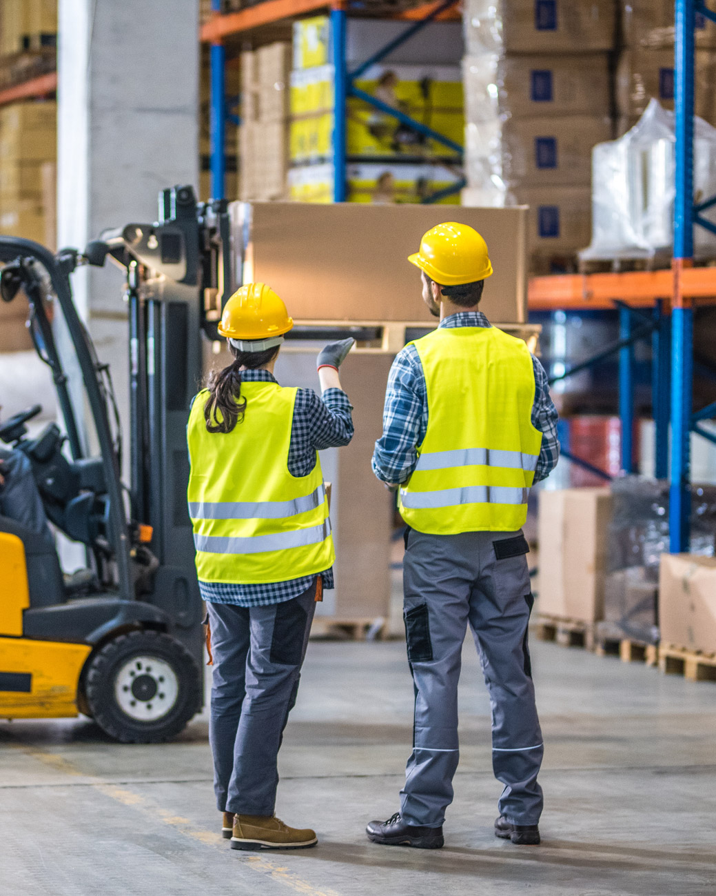 Two warehouse employees.